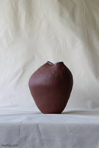 Brown sculptural stoneware vase